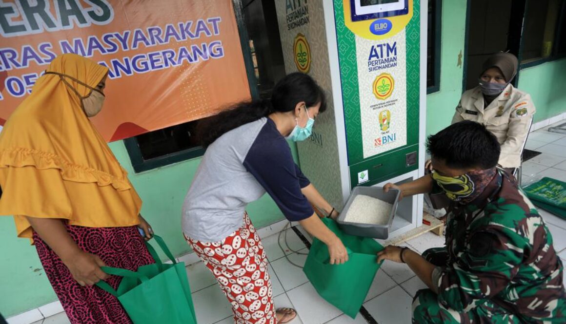 A resident receives free rice at an ATM in Indonesia in 2020 SOPA IMAGES/LIGHTROCKET VIA GETTY IMAGES